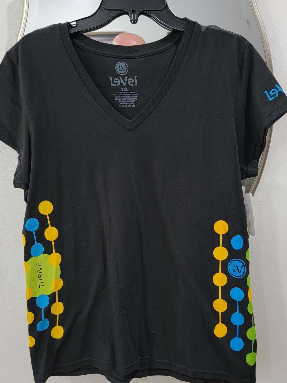 Level Women’s Black Short Sleeve V-Neck Tee with Colorful Dot Print